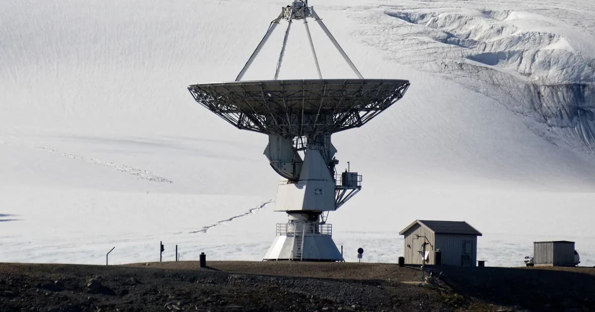 Large satellite dish in a snowy arctic environment for research purposes