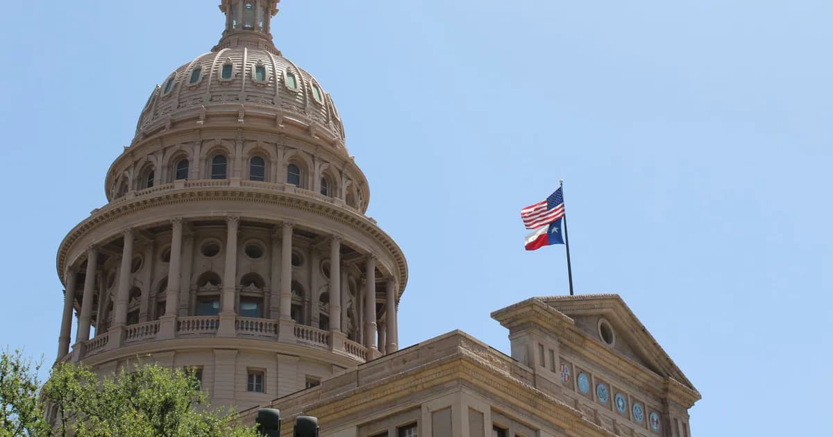 Low angle view of the Texas State Capitol dome and flags in Austin, Texas