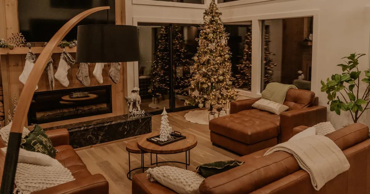 Warm living room with Christmas tree and fireplace
