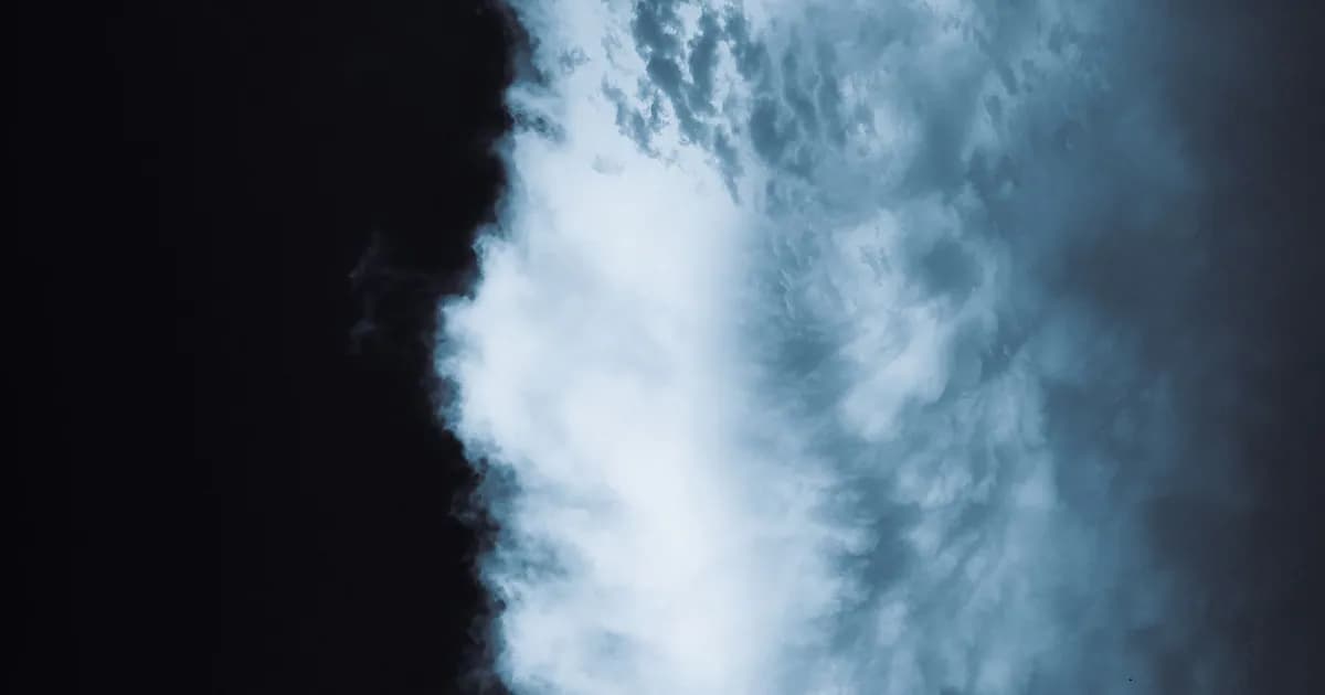 A striking cloudscape with a dramatic contrast between light and dark clouds