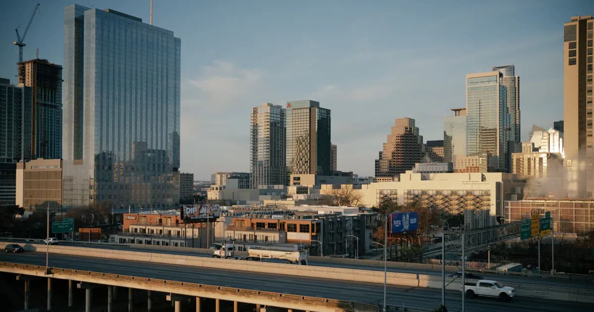 Aerial view of downtown Austin, Texas showcasing modern skyscrapers and urban infrastructure at dusk