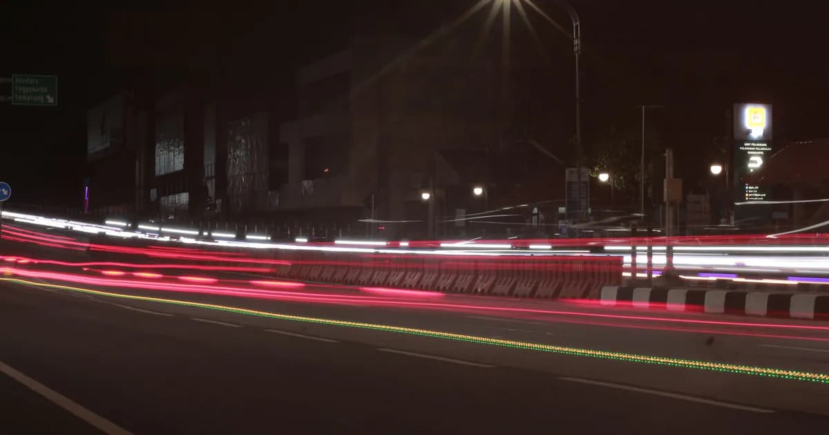 Dynamic city street lights captured through long exposure at night