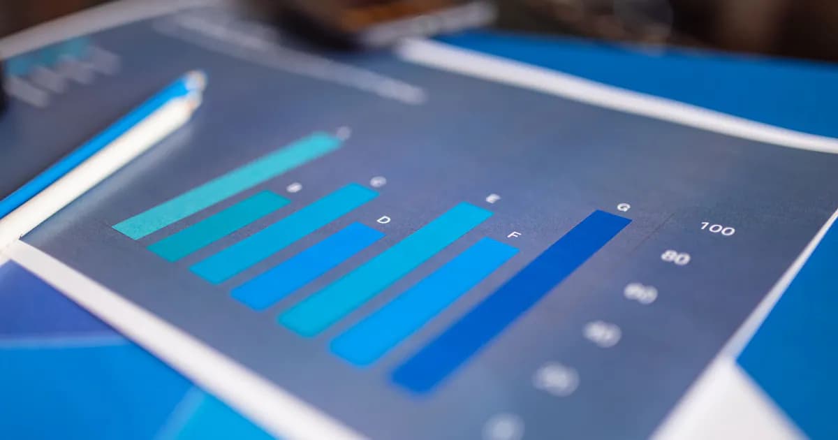 Detailed close-up of a blue bar graph showing data analysis on printed paper